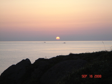 津軽の海に沈む夕日 マシューさん