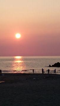 日本海に沈む夕陽 はなもぐ君さん